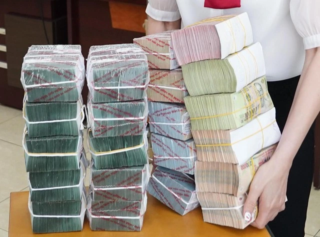 Vietcombank, Agribank giảm lãi suất cho vay 2% đối với khách hàng bị thiệt hại bão lũ - Ảnh 1