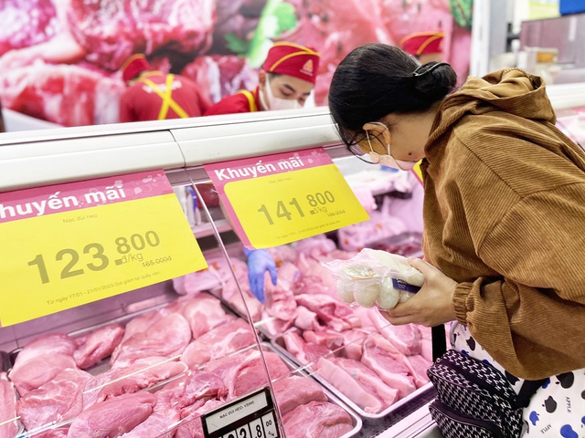 Giá heo gần tết tăng mạnh - Ảnh 1