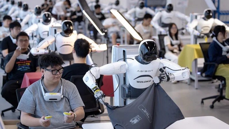 Nghịch lý 2026: Sinh viên công nghệ phải đi ‘làm xiếc’ cho robot học việc và sự thật bên trong trại huấn luyện người máy lớn nhất hành tinh - Ảnh 2