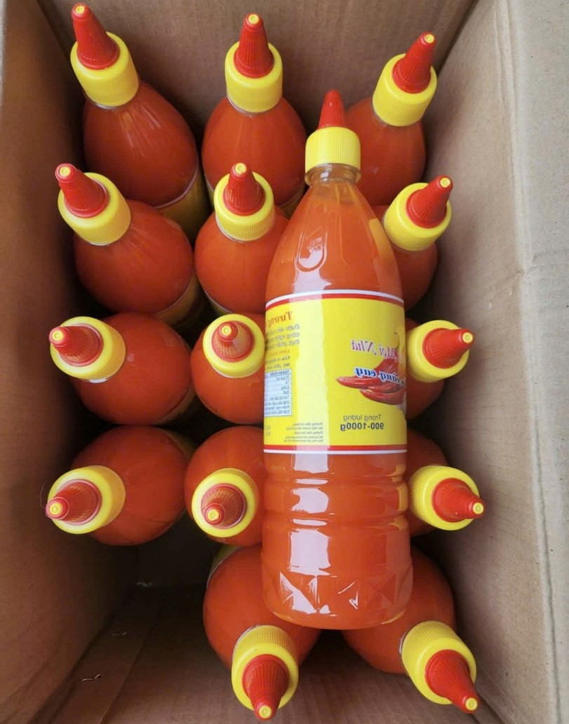 Khởi tố Giám đốc công ty sản xuất hàng nghìn chai tương ớt, nước chấm giả - Ảnh 4