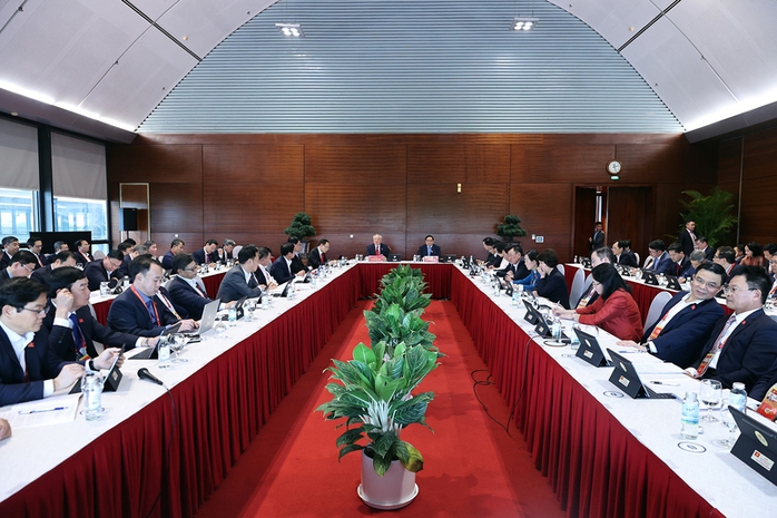 Thảo luận tại Đại hội XIV, Thủ tướng Phạm Minh Chính nhấn mạnh quyết tâm tăng trưởng hai con số - Ảnh 1