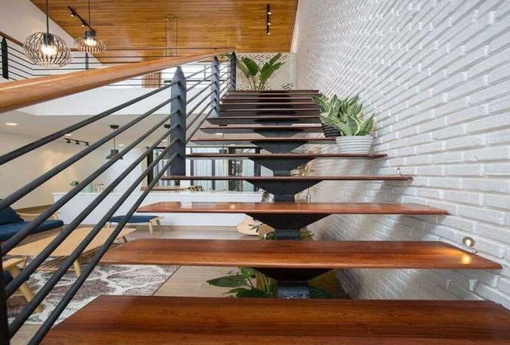 Các mẫu cầu thang xương cá độc đáo cho nhà phố - Ảnh 3