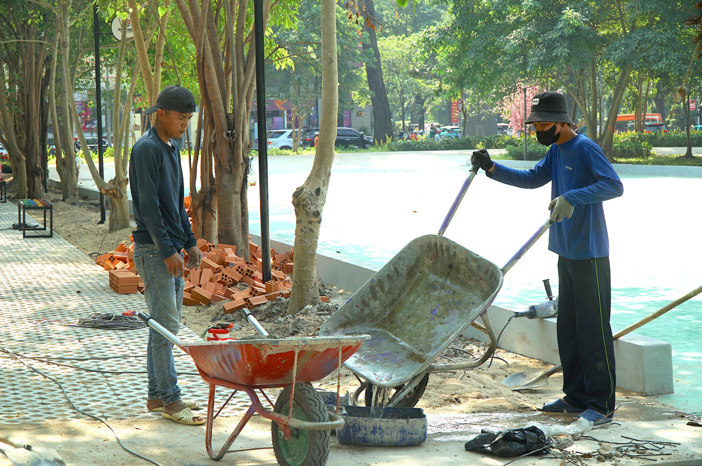 'Đất vàng' bỏ hoang giữa trung tâm TPHCM thành công viên đông vui dịp Tết - Ảnh 12