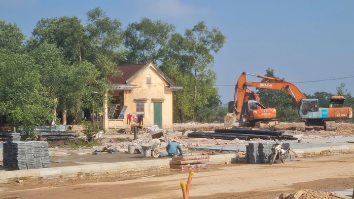 Chạy nước rút trên công trường tái định cư - Ảnh 1