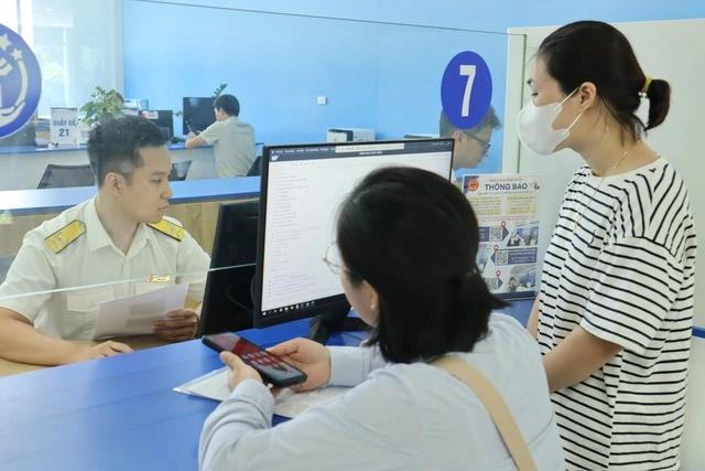 Thuế Hà Nội giải quyết thủ tục tại 31 điểm phục vụ hành chính công - Ảnh 1