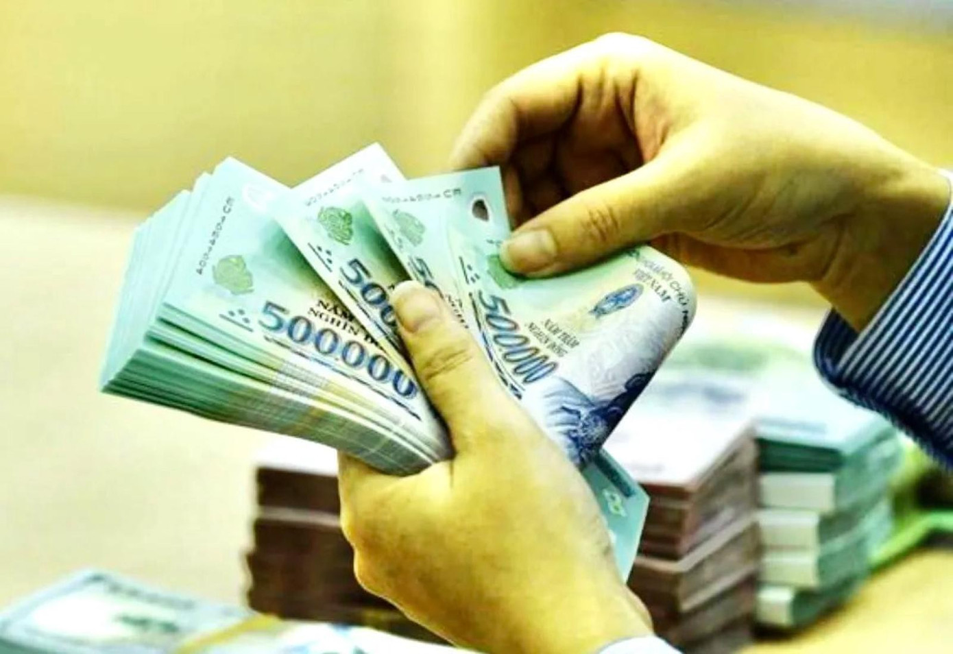 Đôn đốc doanh nghiệp chi trả đầy đủ lương, thưởng Tết cho người lao động - Ảnh 1