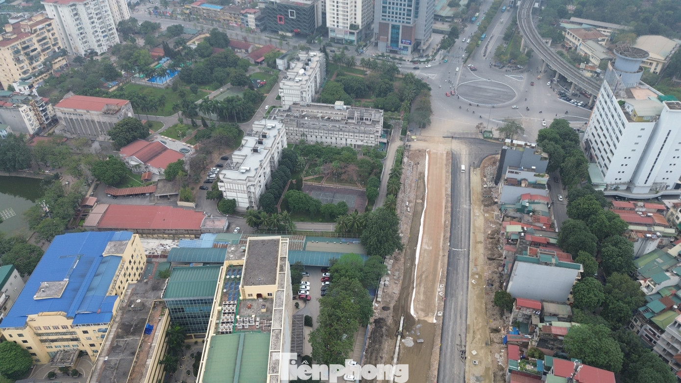 Hà Nội: Công nhân làm việc xuyên Tết trên công trường Vành đai 1 - Ảnh 1