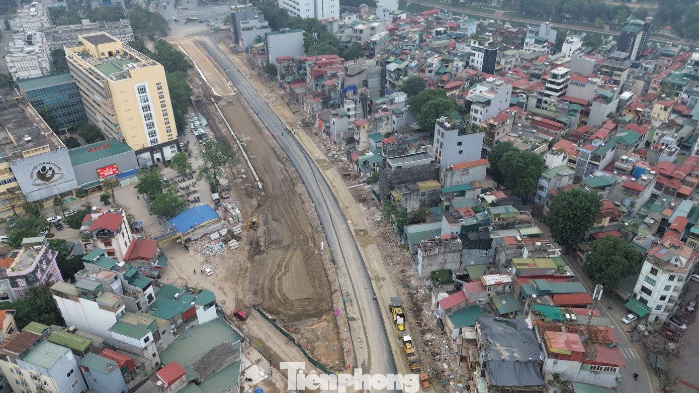 Hà Nội: Công nhân làm việc xuyên Tết trên công trường Vành đai 1 - Ảnh 2