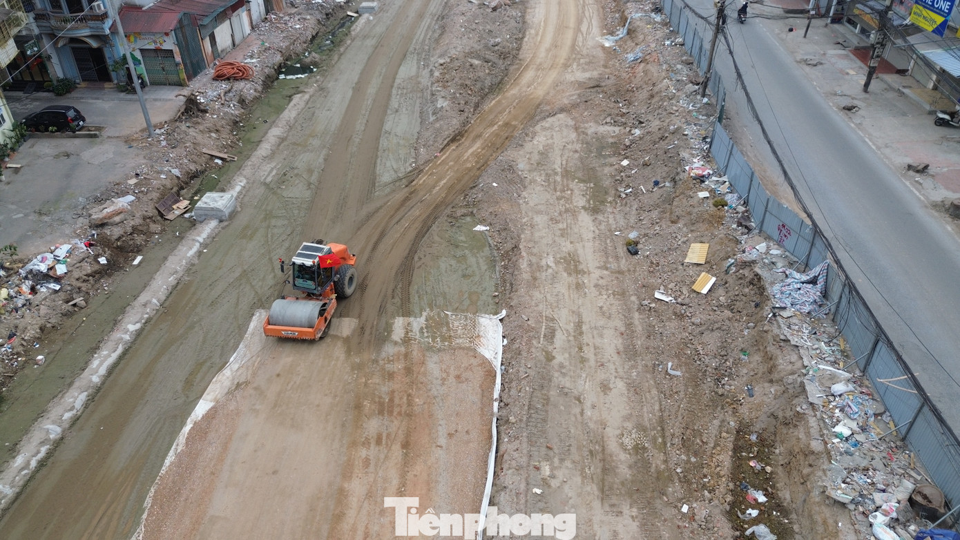 Hà Nội: Công nhân làm việc xuyên Tết trên công trường Vành đai 1 - Ảnh 5