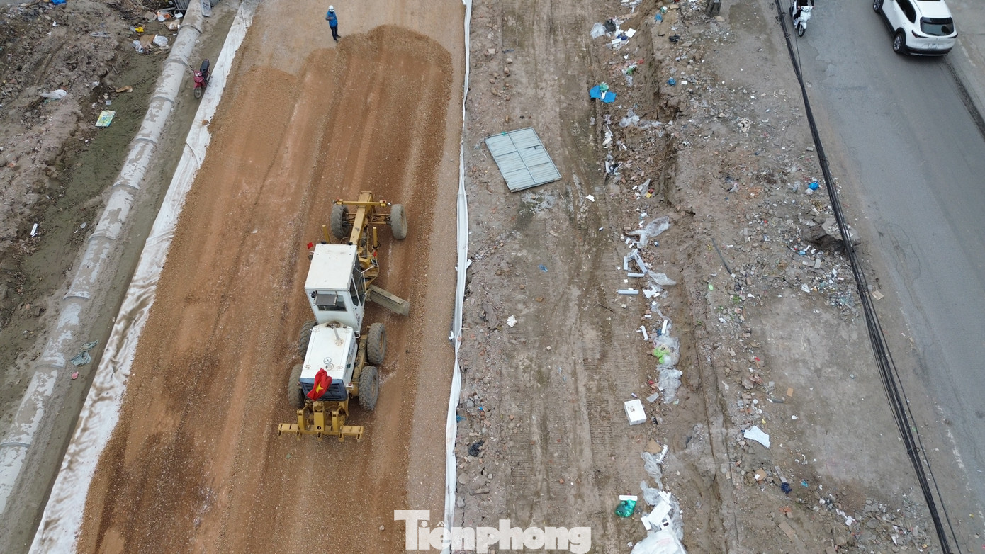 Hà Nội: Công nhân làm việc xuyên Tết trên công trường Vành đai 1 - Ảnh 6