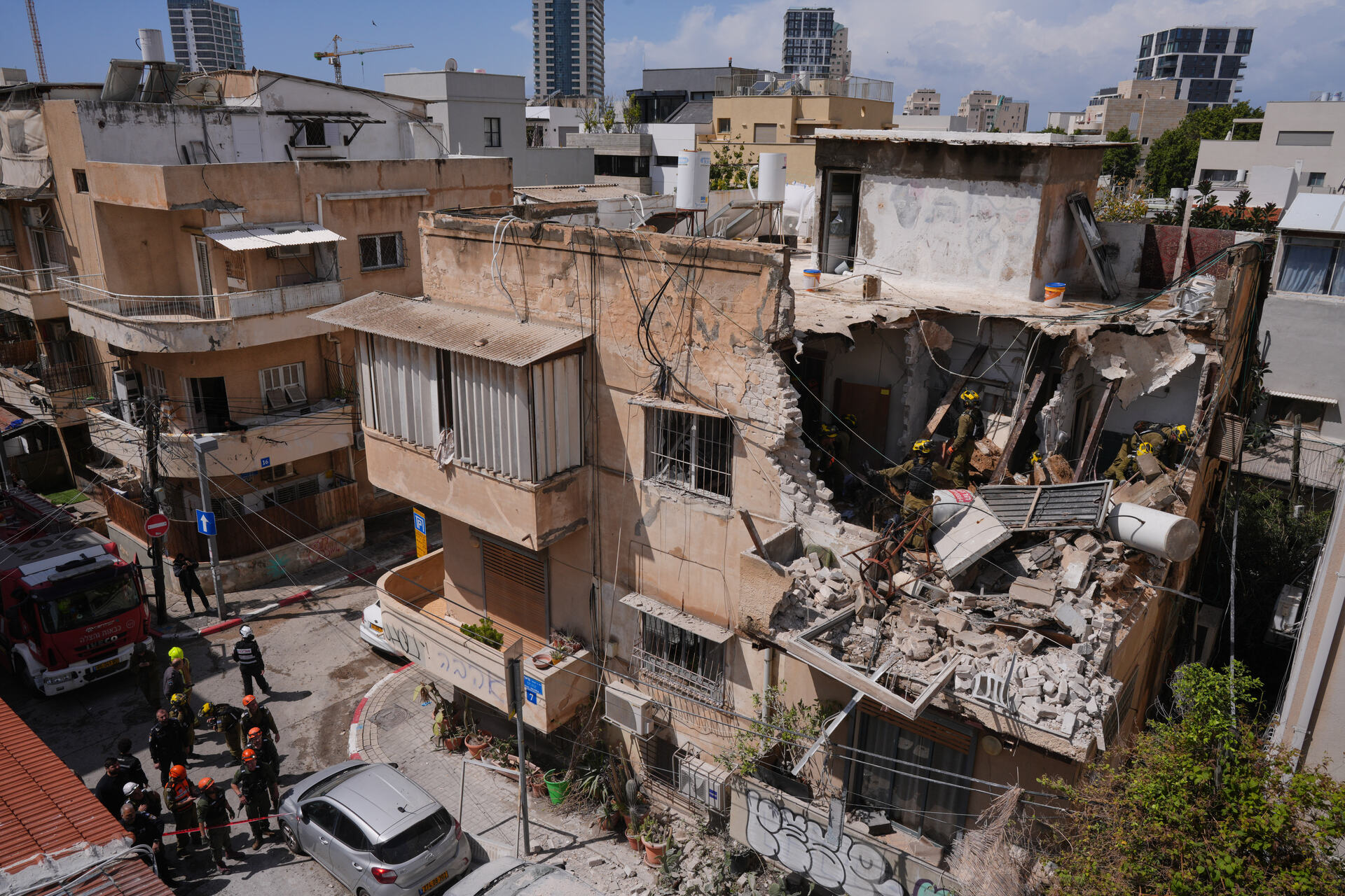 Thủ đô Israel oằn mình hứng 7 đợt tên lửa Iran dội xuống suốt từ đêm đến sáng - Ảnh 8