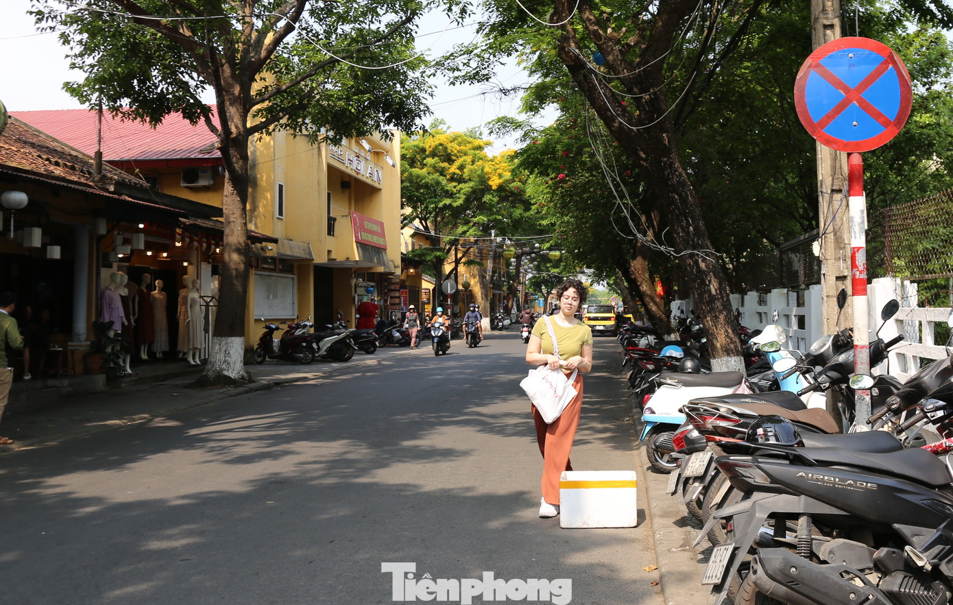 Diện mạo 'lạ' của phố cổ Hội An trước giờ G ‘siết’ vỉa hè - Ảnh 24