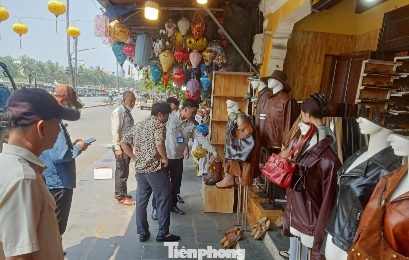 Diện mạo 'lạ' của phố cổ Hội An trước giờ G ‘siết’ vỉa hè - Ảnh 28