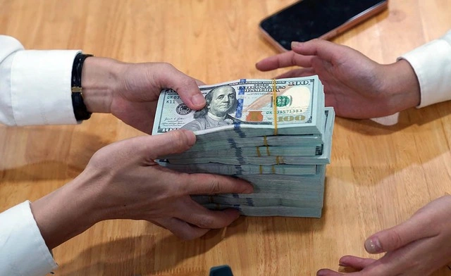 Tỷ giá phập phồng tăng - Ảnh 1