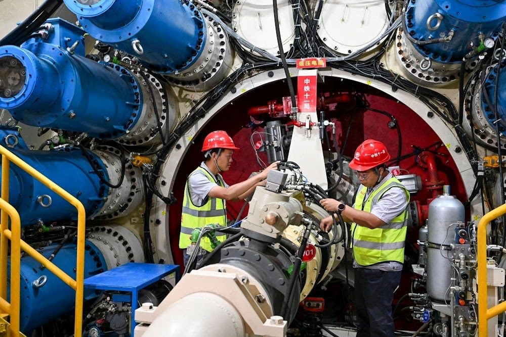 Phát minh rung chuyển ngành xây dựng của Trung Quốc: Robot xây nhà, AI trực tiếp điều phối siêu dự án 16 km dưới đáy biển với sai số dưới 1 mm - Ảnh 3