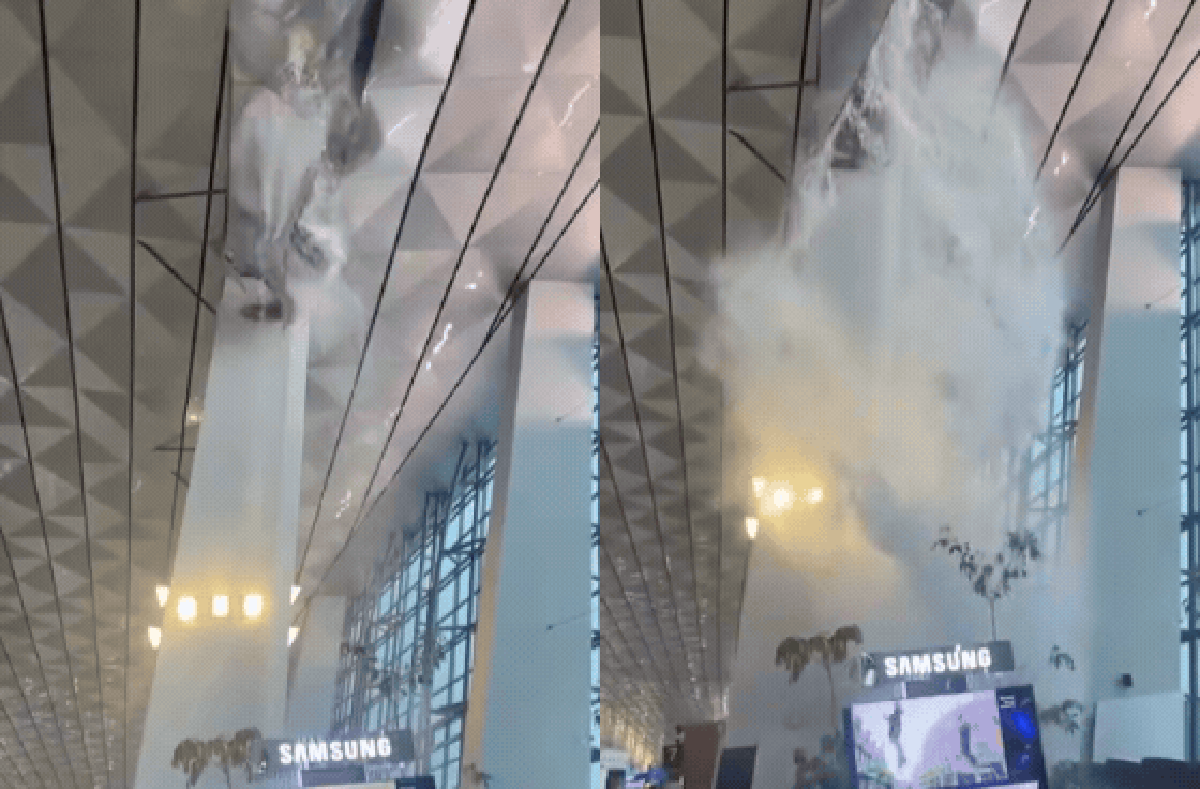 Trần nhà ga T3 sân bay ở Jakarta đổ sập giữa trời mưa, nước xối như thác đổ khiến hành khách hoảng loạn