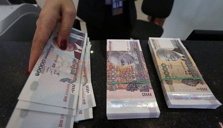 Giữa lúc nợ xấu tăng cao, một ngân hàng Campuchia bất ngờ siết chặt giao dịch, chỉ cho khách rút chưa đến 8 triệu/ngày - Ảnh 1