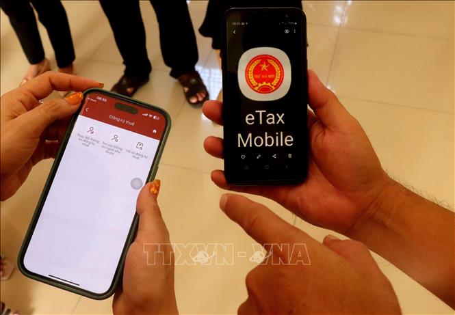 Khoảng 2,3 triệu hộ kinh doanh đã đăng ký eTax Mobile - Ảnh 1