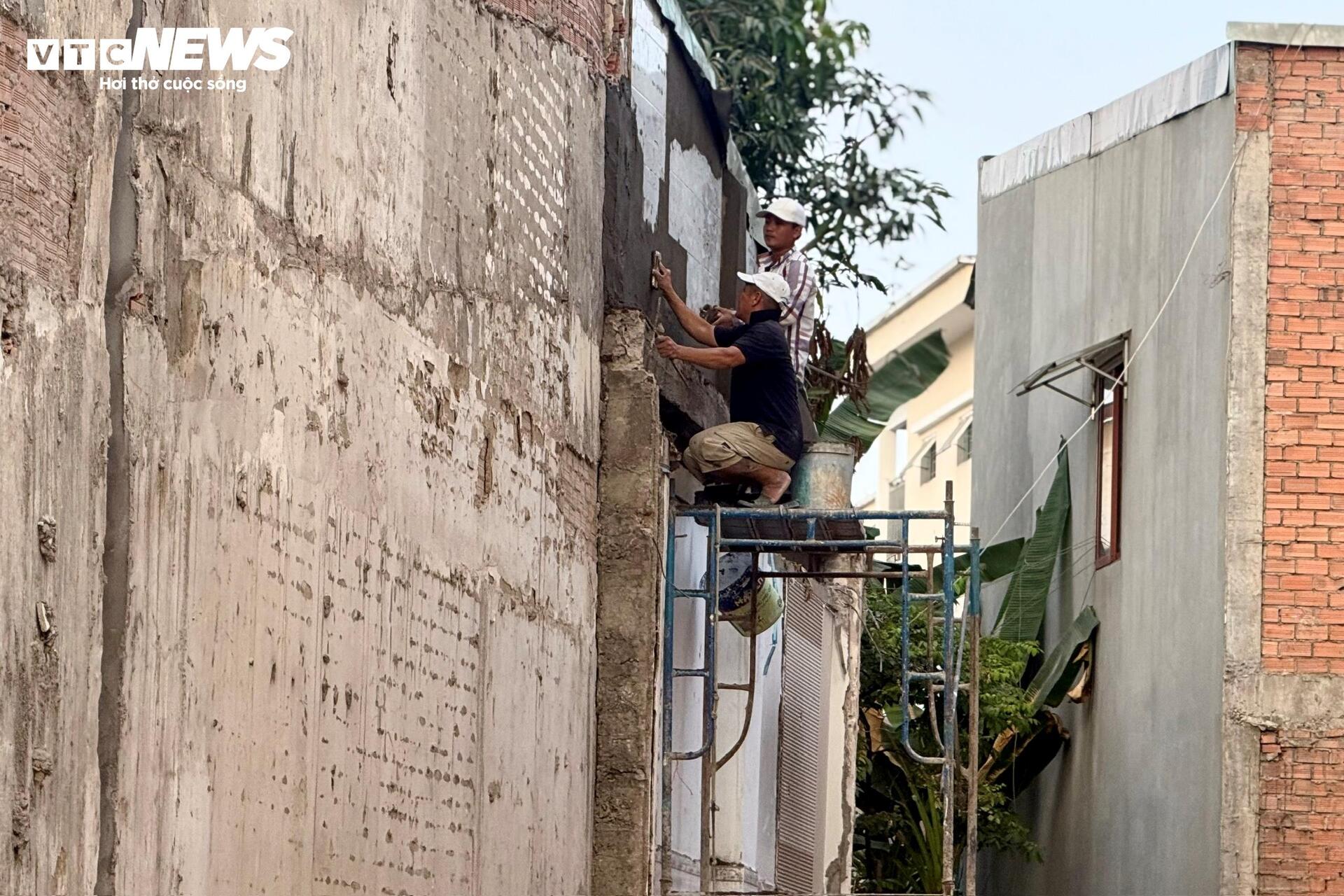 Người dân TP.HCM dỡ nhà, giao mặt bằng làm dự án Quốc lộ 13 mở rộng - Ảnh 8