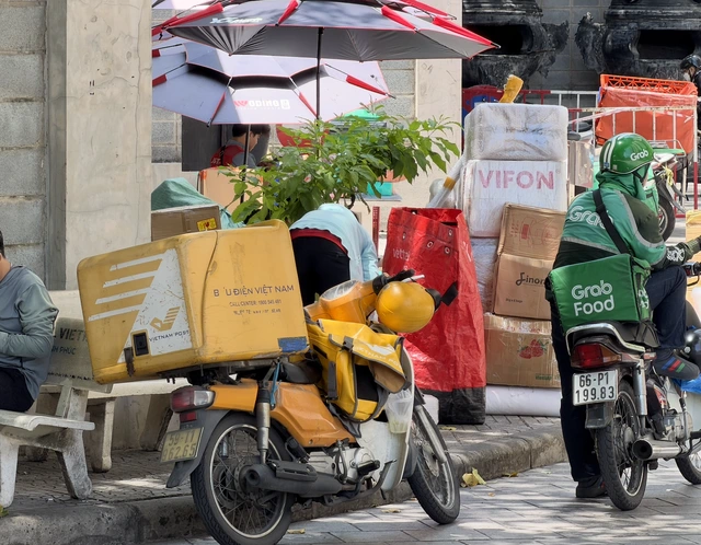 Phí giao hàng chỗ tăng, chỗ giảm - Ảnh 1