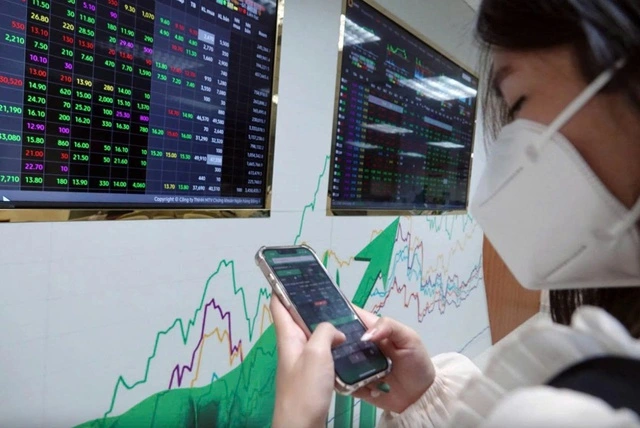 Cổ phiếu Vingroup, Vinhomes, FPT... bùng nổ sau thông tin chứng khoán được nâng hạng - Ảnh 1