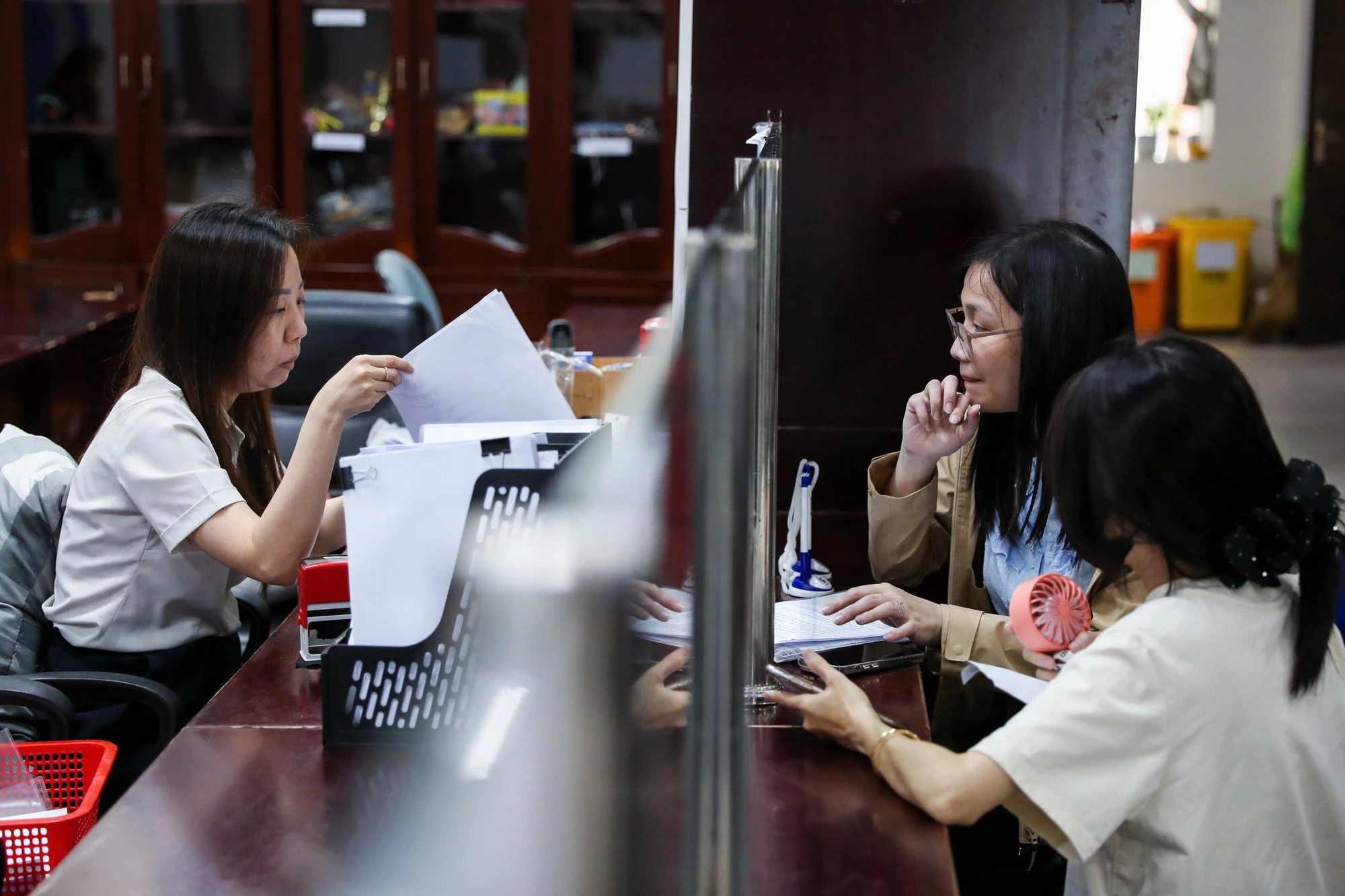 Thu nhập thấp xót tiền trừ thuế - Ảnh 1