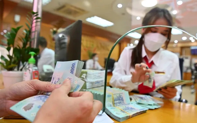 Phó Thủ tướng yêu cầu kéo giảm lãi suất cho vay xuống mức thấp nhất có thể - Ảnh 1