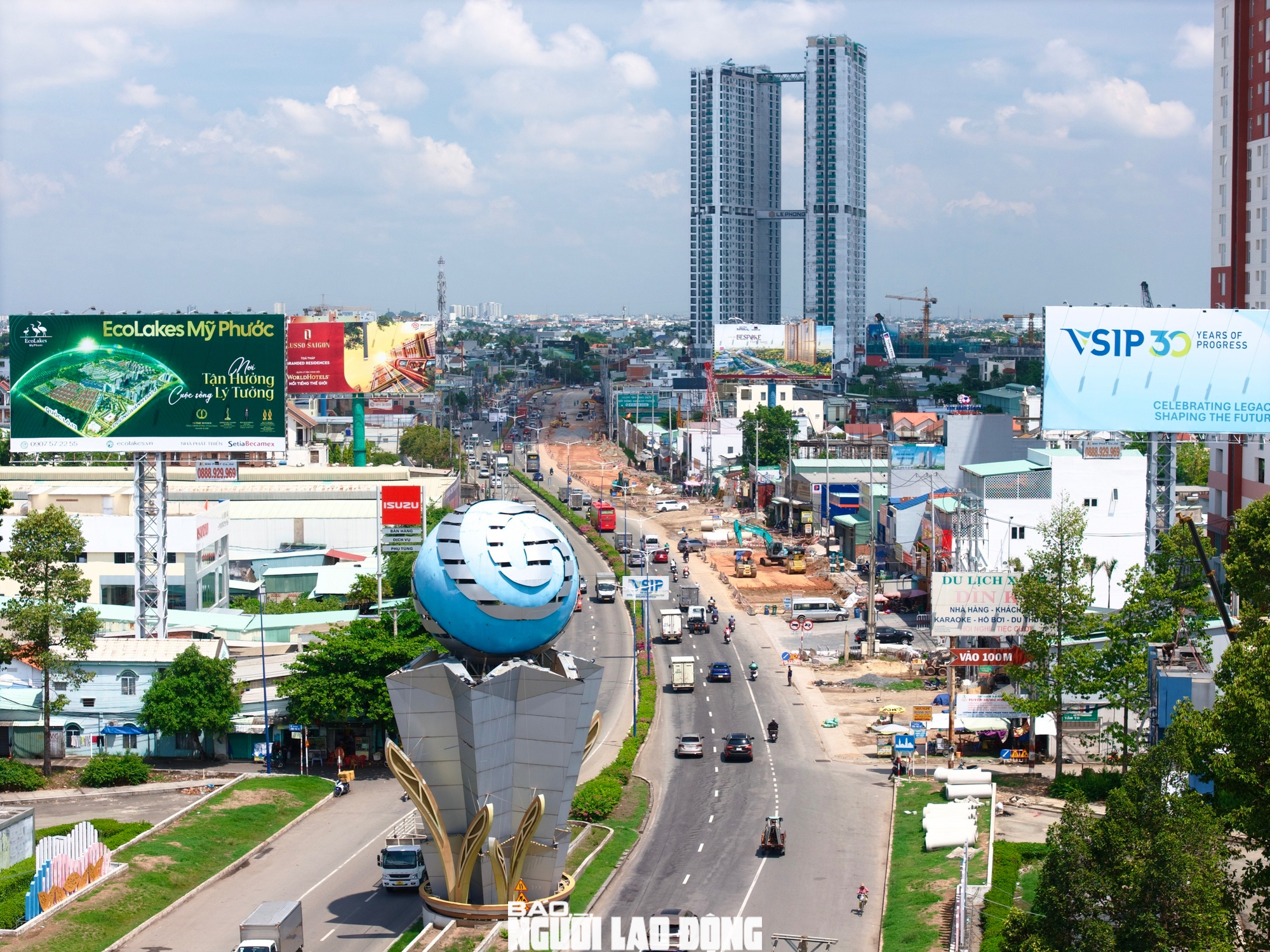 Toàn cảnh Quốc lộ 13 sau gần 4 năm mở rộng lên 8 làn xe - Ảnh 1