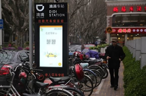 ‘Chén cơm’ của 400.000 tài xế taxi truyền thống tại siêu đô thị lớn bậc nhất châu Á sắp bị đạp đổ, mỗi ngày chỉ được nhận 13 cuốc khách - Ảnh 1