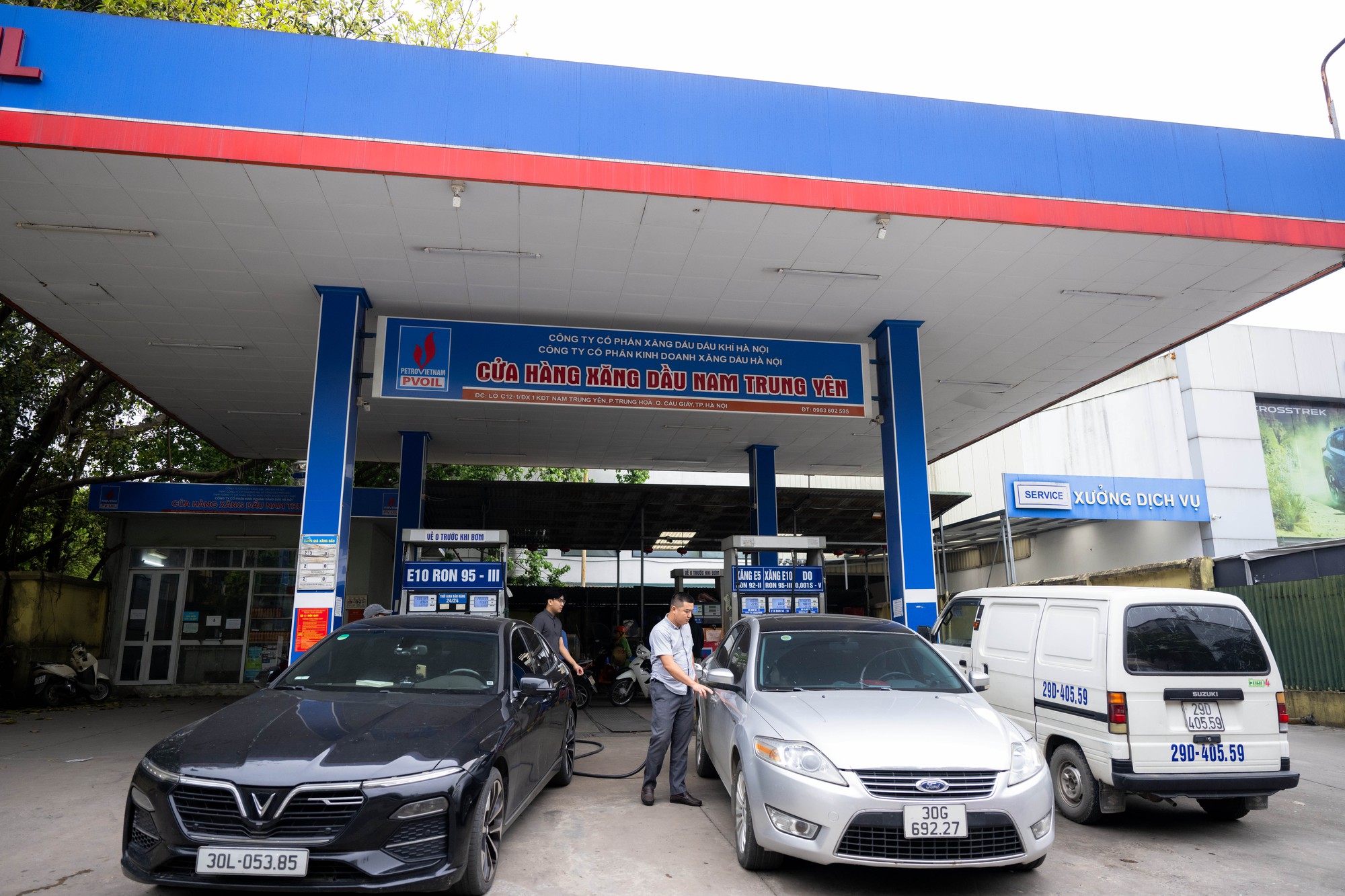 Vòng quanh Hà Nội và TP.HCM: Loạt cây xăng vẫn bán song song xăng E5 cùng E10 - Ảnh 16