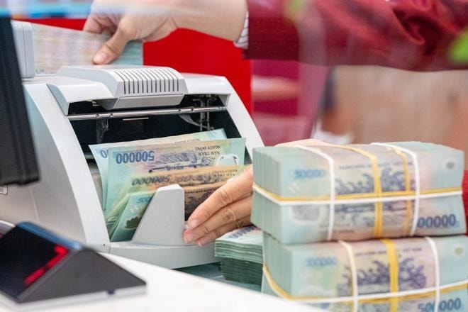 Chuyên gia: Thông tư 25 có thể giúp hệ thống ngân hàng bơm thêm 1 triệu tỷ đồng vốn trung và dài hạn, lĩnh vực bất động sản hưởng lợi - Ảnh 1