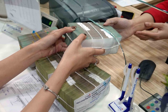 Nhiều chính sách khơi thông dòng vốn tín dụng - Ảnh 1