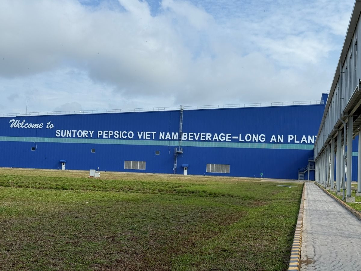 Khám phá nhà máy lớn nhất châu Á của Suntory PepsiCo tại Tây Ninh: 20 ha, vốn 300 triệu USD, robot chạy 24/7 - Ảnh 1