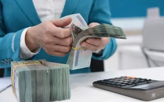 Ngành thuế thu hồi đạt trên 52.000 tỷ đồng nợ thuế - Ảnh 1