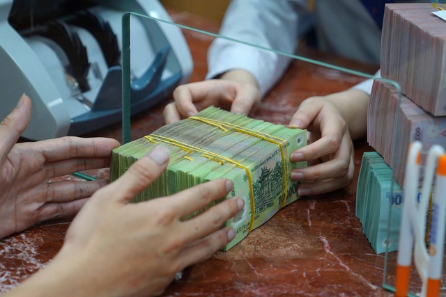 Nhiều doanh nghiệp 'bạo tay' chi cổ tức - Ảnh 1