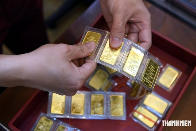 Vàng tăng không đủ bù lỗ, ngân hàng hút USD - Ảnh 1