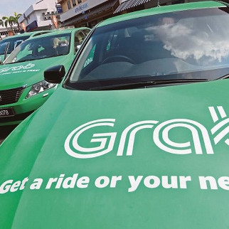 Hiệp hội taxi Hà Nội kiến nghị Grab phải gắn mào