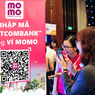 Vietcombank hợp tác Ví MoMo ủng hộ ngày không tiền mặt